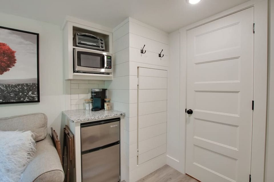 Cozy tiny cottage kitchenette stocked with essentials | prepare meals with ease, from morning coffee to dinner, perfect for couples or solo travelers seeking a relaxing nature escape