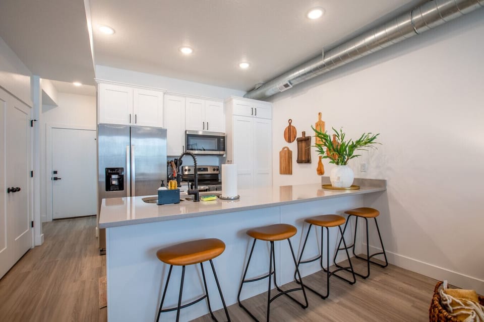 Kitchen island with bar seating — perfect for casual meals or morning coffee.