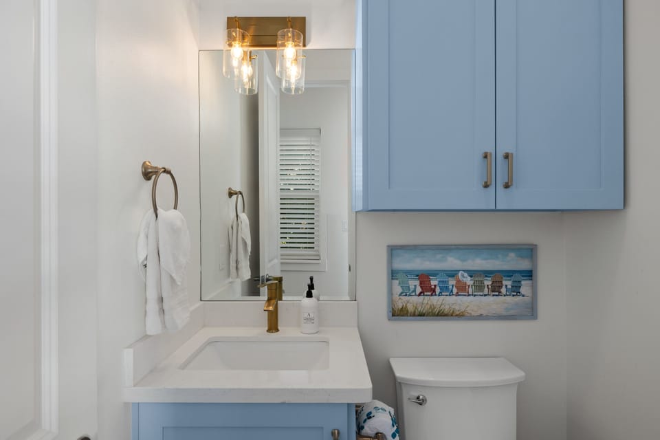 A convenient half bath on the ground level adds extra comfort for everyone in your group.