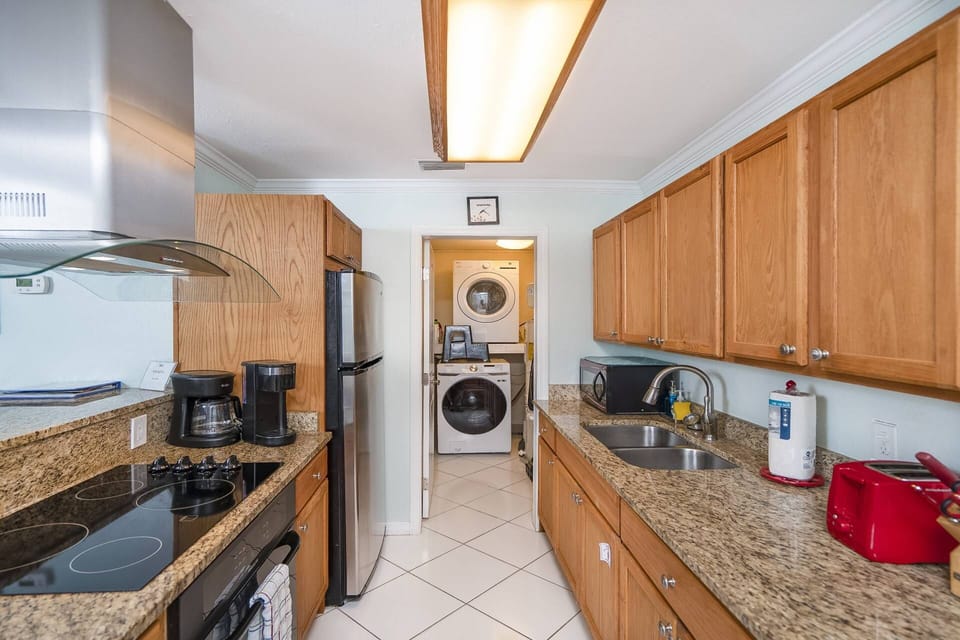 Stay fresh and ready for the next beach adventure! A washer and dryer tucked away ensures that sandy clothes and beach towels are no match for your wo