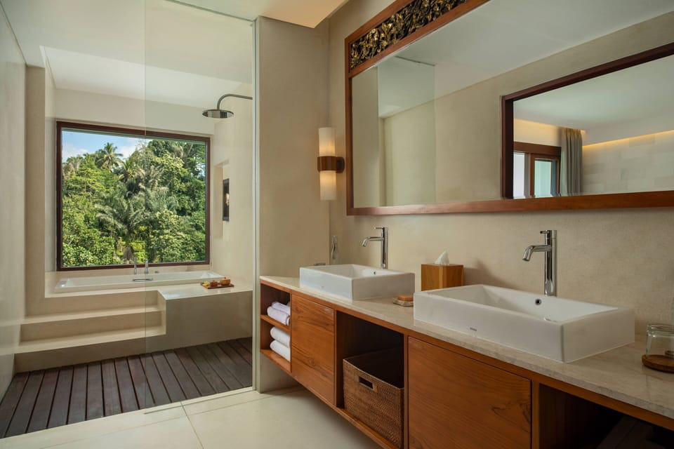 Suite, 1 Bedroom (View) | Bathroom | Separate tub and shower, deep soaking tub, rainfall showerhead