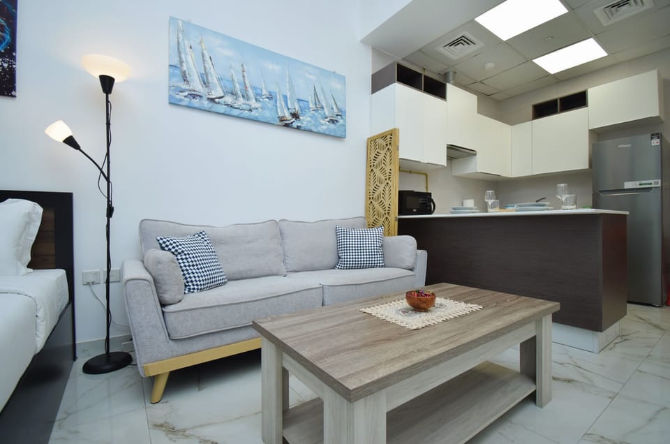 Family Studio, 1 King Bed, Non Smoking, Terrace | Living area | 48-inch flat-screen TV with digital channels, TV