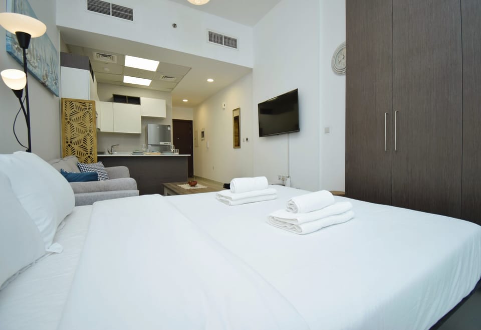 Family Studio, 1 King Bed, Non Smoking, Terrace | Living area | 48-inch flat-screen TV with digital channels, TV