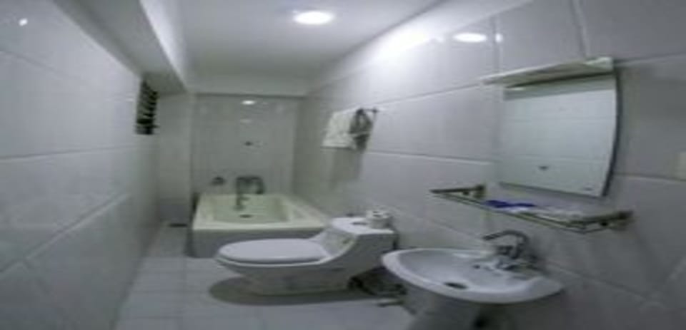 Shower, rainfall showerhead, towels, soap