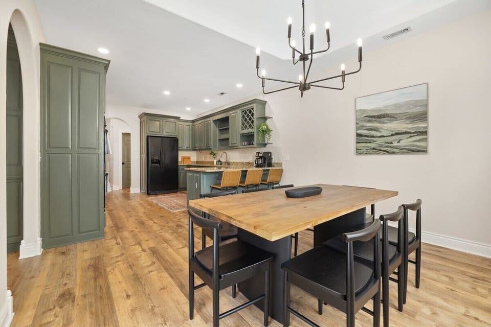 Just off the kitchen, you'll find our eight-top dining table.