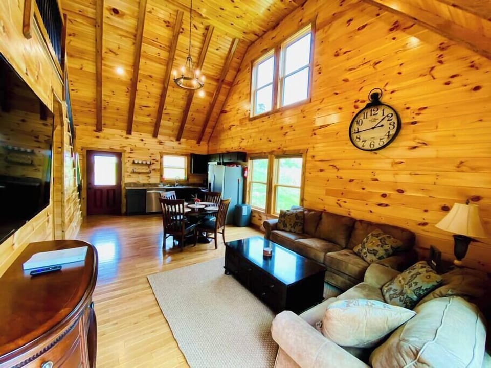 Cozy living room with comfy couch, Smart TV, and Wi-Fi — the perfect place to unwind.