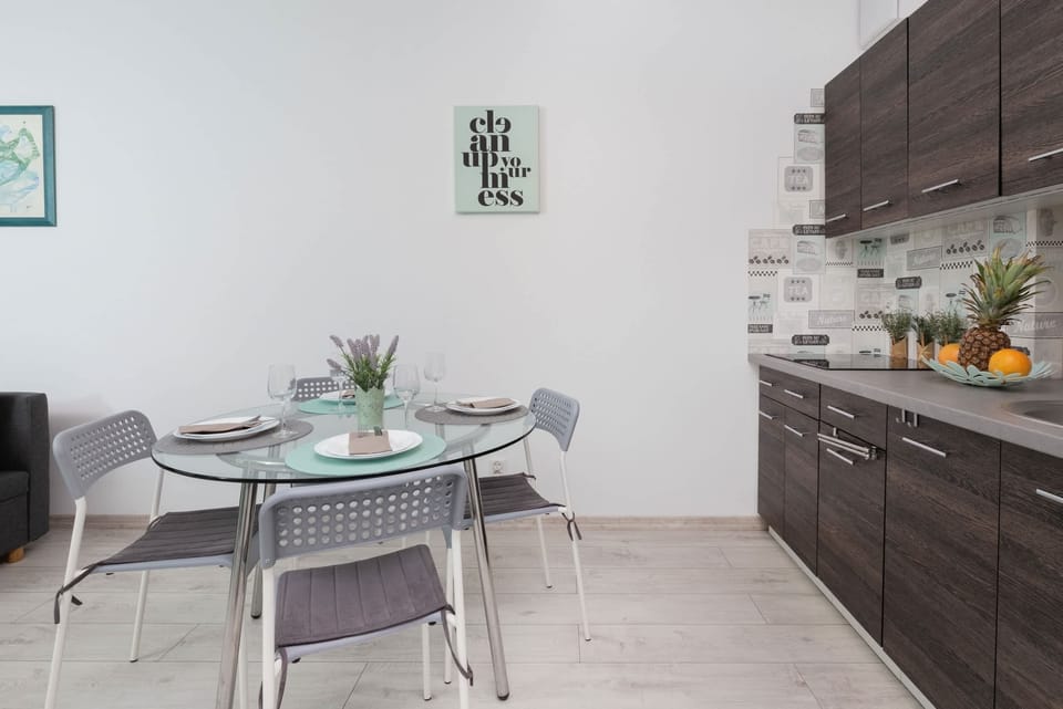 A second view of the dining area, showcasing its simplicity and elegance, with ample lighting.