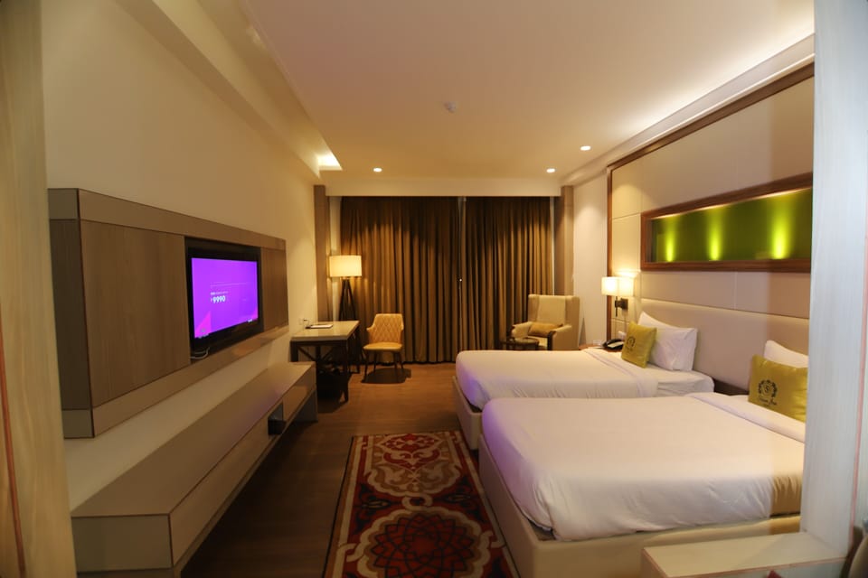 Executive Room | 1 bedroom, desk, laptop workspace, iron/ironing board