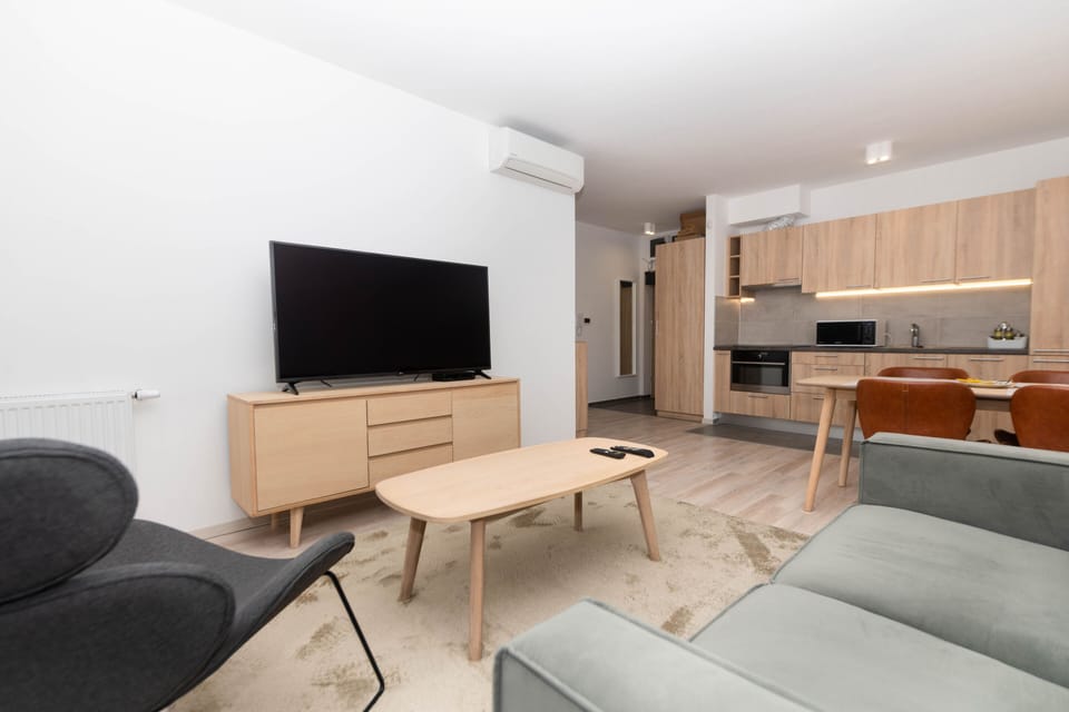 Deluxe Two-Bedroom Apartment with Balcony | Private kitchen | Full-size fridge, oven, stovetop, dishwasher