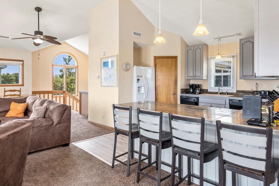 WH444: Pelican Breeze | Top Level Living Area and Kitchen