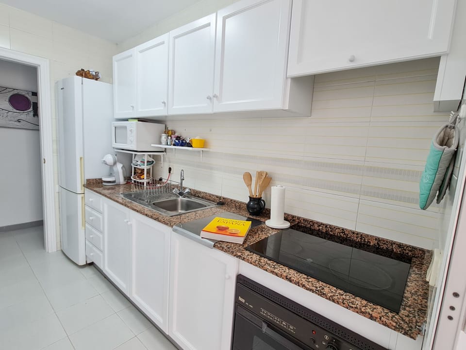 Separate kitchen with access to dining terrace