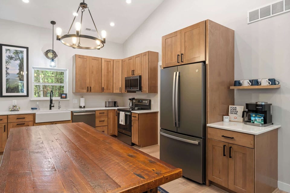 The kitchen includes custom touches such as the coffee bar