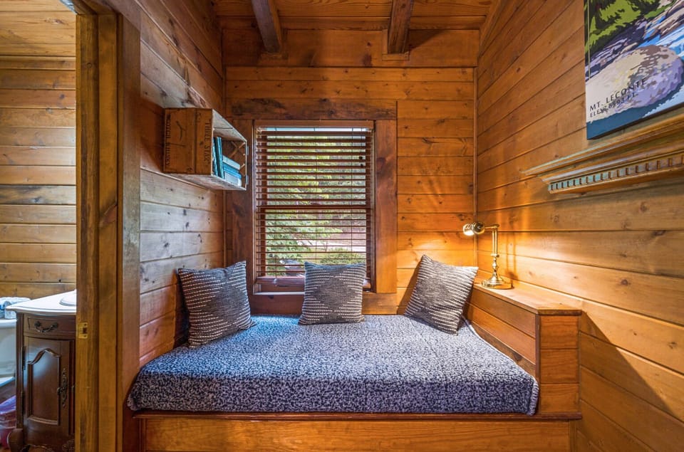 Enjoy this cozy reading nook, directly up the stairs.

