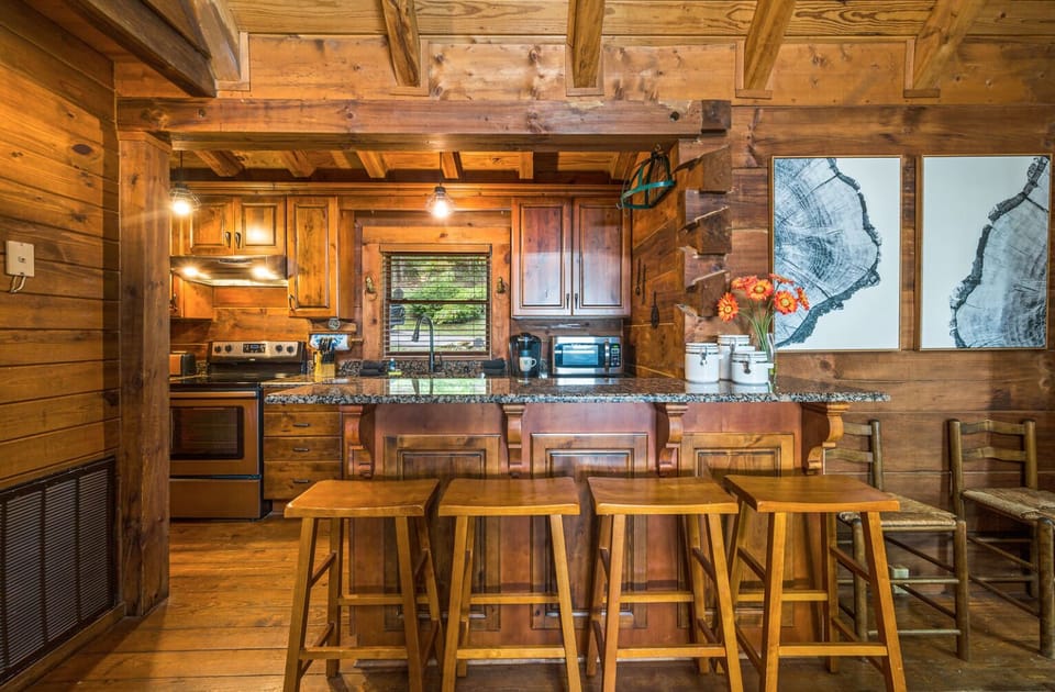 Sit by the bar while watching your family cook a gourmet meal! 
