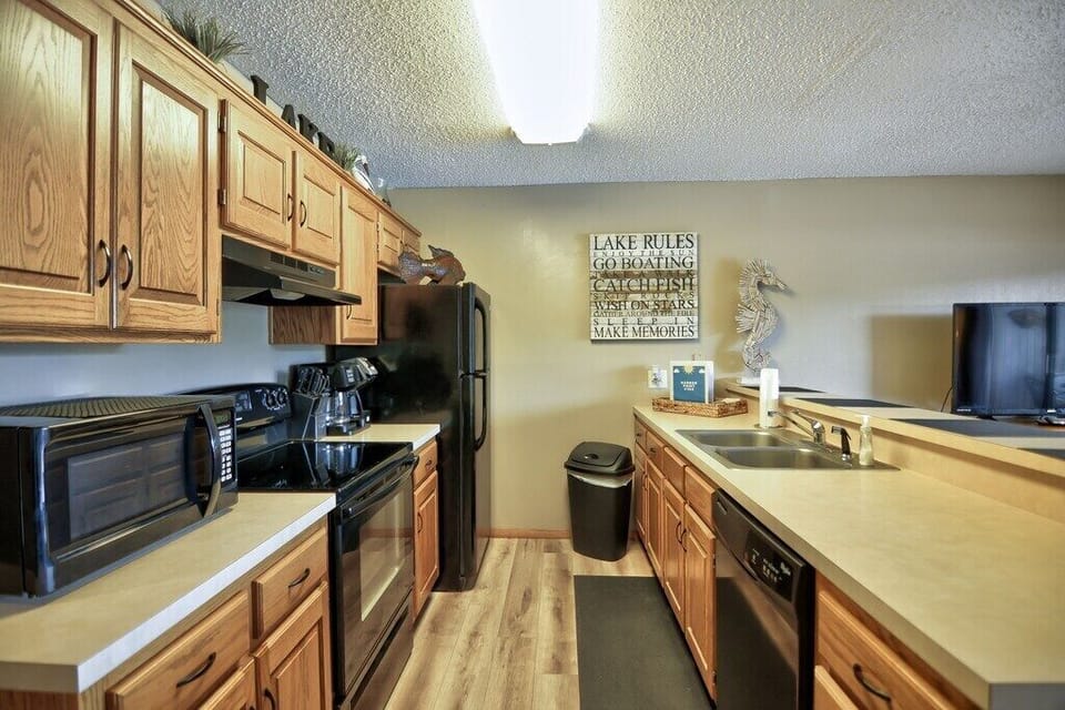 stovetop, refrigerator, oven, coffee maker, microwave, dishwasher