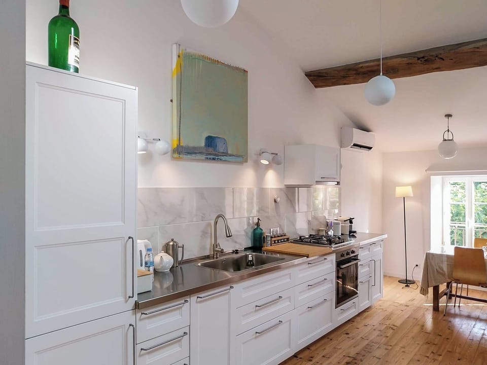 First floor open plan main living room, dining room and kitchen