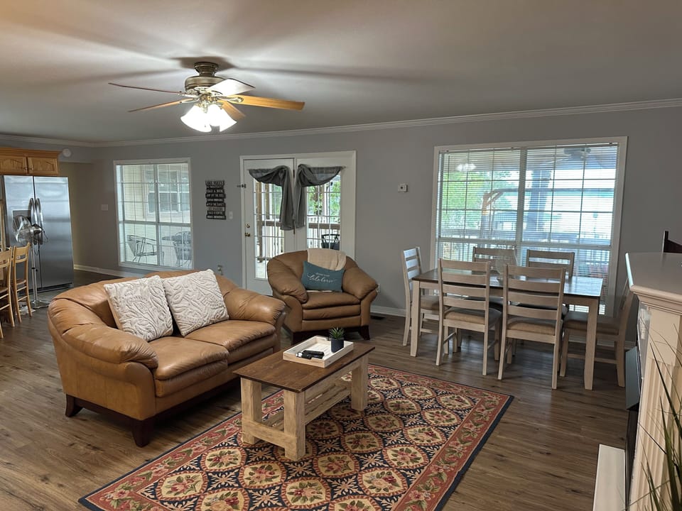 Main living area with full windows over looking the beautiful lake 