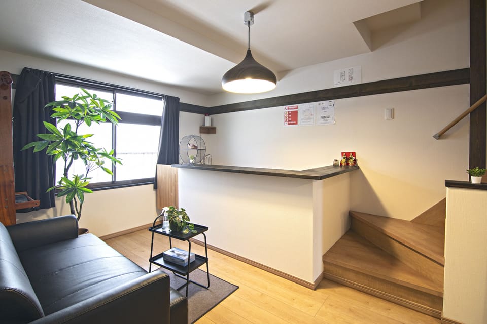 Deluxe Villa | Living area | 32-inch flat-screen TV with cable channels
