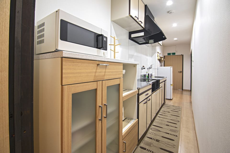 Deluxe Villa | Private kitchen | Fridge, microwave, stovetop, electric kettle