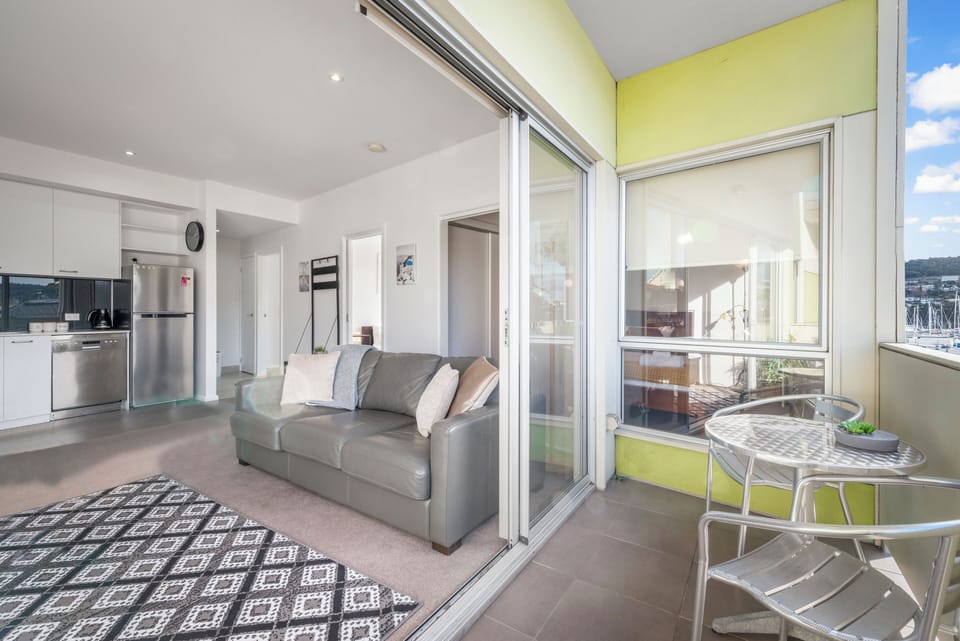 Comfort Apartment | Living area | 50-inch TV with digital channels