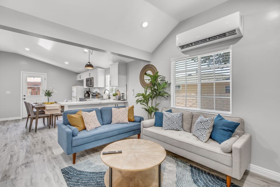 Relax in this cozy living room featuring comfortable seating.