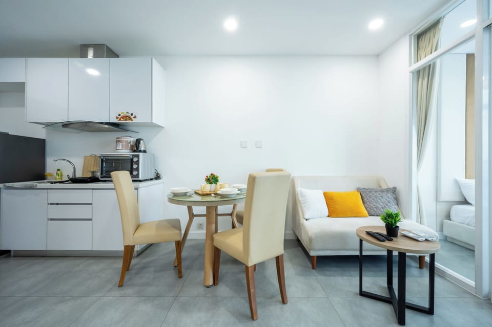 Basic Apartment, 2 Bedrooms, Balcony, City View | Living area | 42-inch Smart TV with digital channels, TV