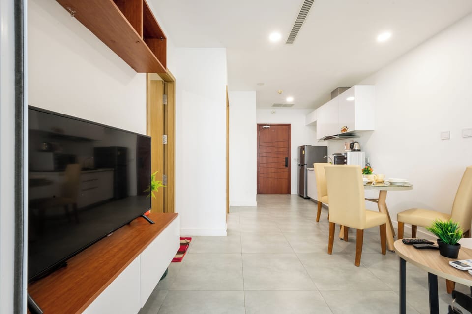 Basic Apartment, 2 Bedrooms, Balcony, City View | Living area | 42-inch Smart TV with digital channels, TV
