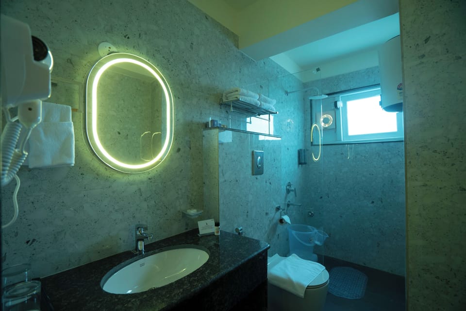 Hydromassage showerhead, free toiletries, hair dryer, slippers