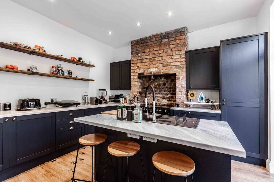 Fully Fitted Kitchen with everything you need to enjoy a lovely stay, including ample counter space.