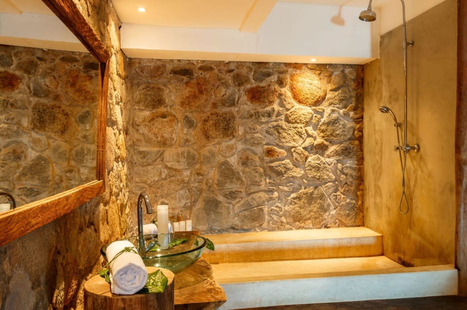 Suite, Sea View | Bathroom | Free toiletries, hair dryer, towels