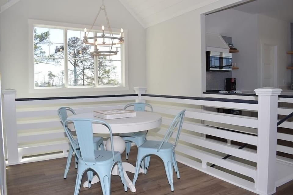 Cozy nook area with additional table and chairs.