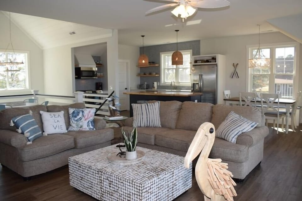 Fully open kitchen, dining, and living room.