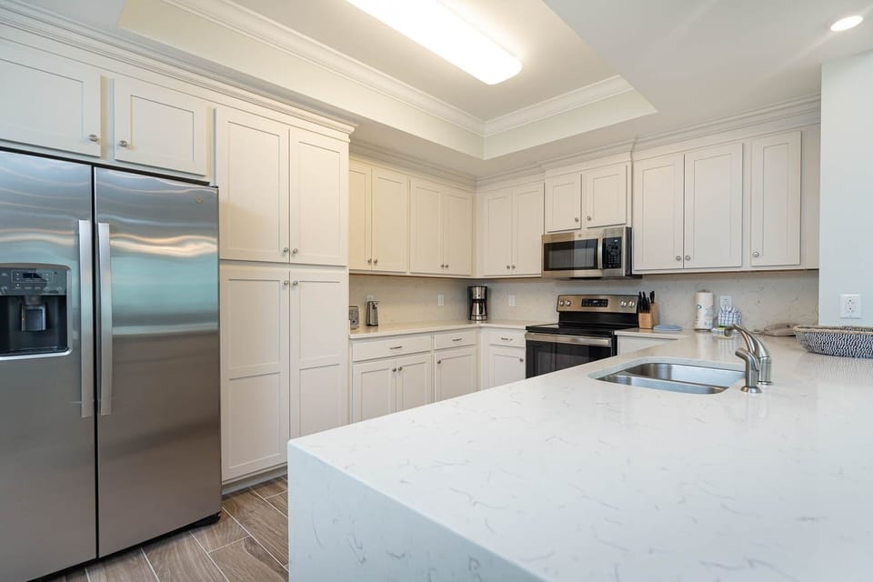 Condo, 4 Bedrooms | Private kitchen | Coffee/tea maker, fridge, oven