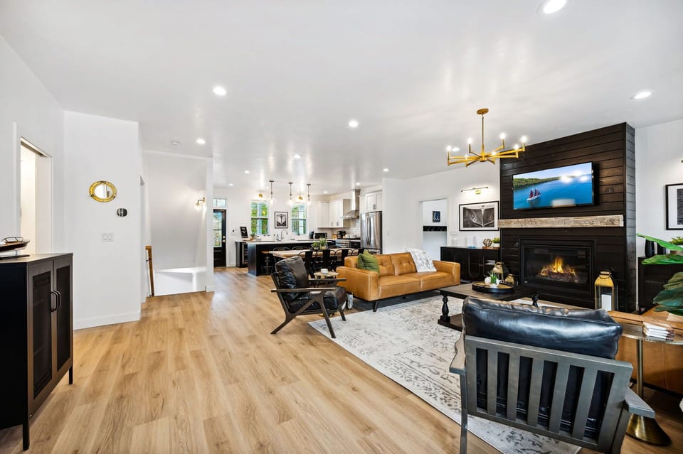Spacious luxury awaits at The Sister Bay Haus! The open-concept design seamlessly blends the living, dining, and chef’s kitchen, creating an inviting space for cherished moments with your favorite people!  Your luxe retreat starts here—where style and relaxation come naturally.