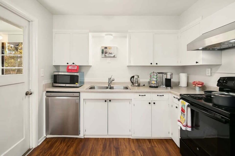 Whip up snacks or meals in this bright, well-stocked kitchen—complete with coffee, a microwave, and all the basics.