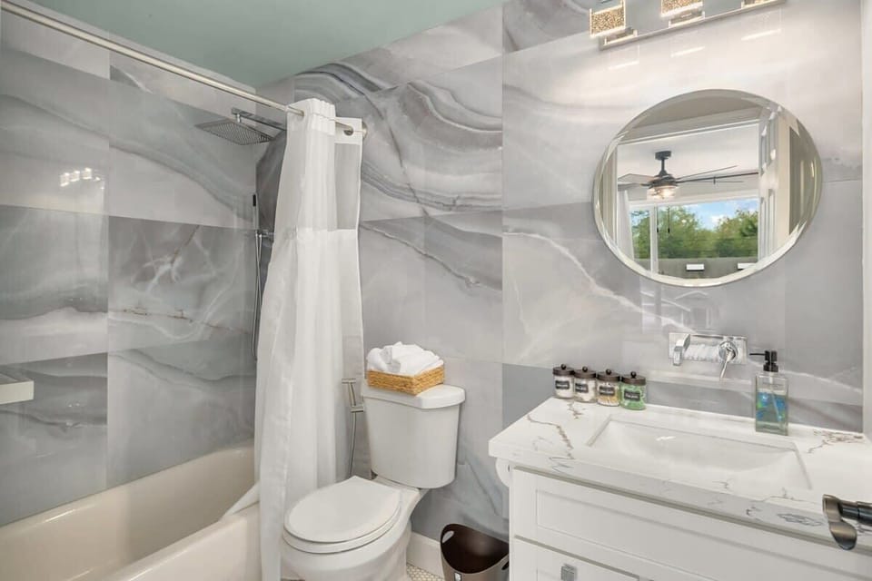 Here is the ensuite master bathroom with beautiful marble tile