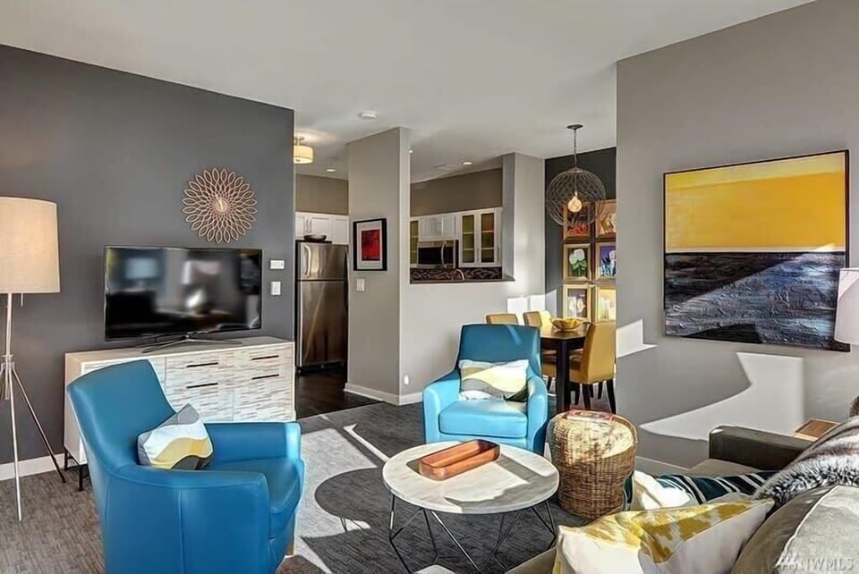Designer paint colors and decor throughout this stunning updated 2 bedroom condo. Unit is drenched in natural light with large windows and high ceilings. $40,000 in upgrades, Wow!