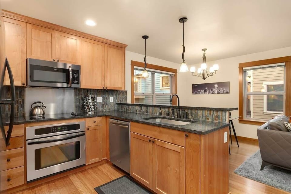 Stainless appliances in the kitchen on 2F (dishwasher, oven, and microwave) 
