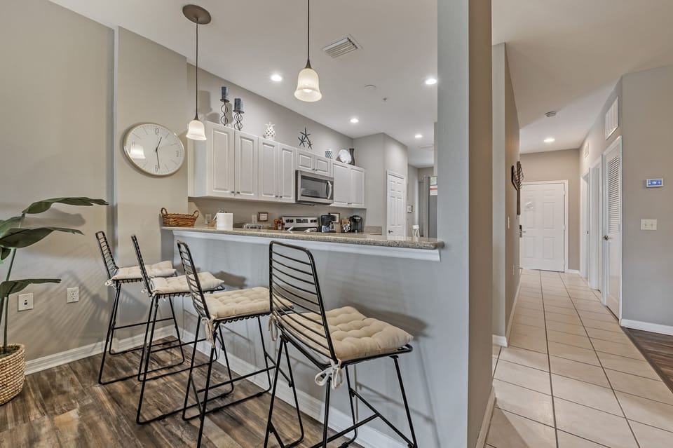 Enjoy meals or a quick snack at the kitchen eating bar.