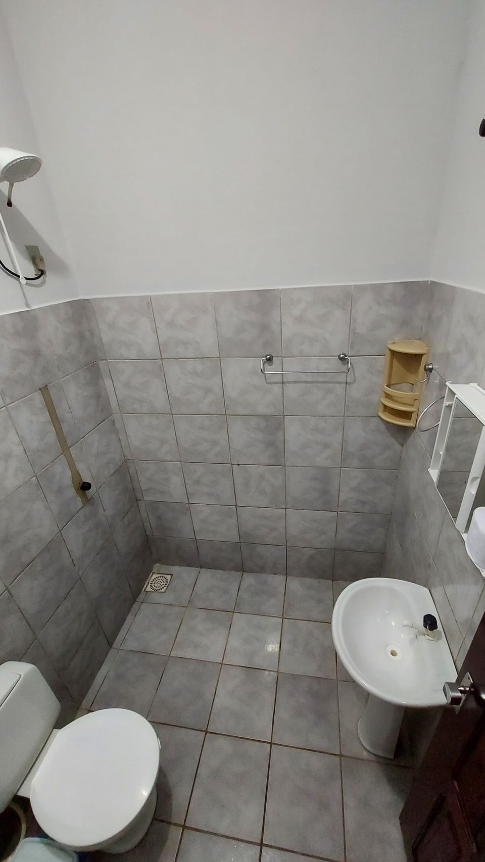 Basic Single Room | Bathroom | Shower, towels, soap, toilet paper