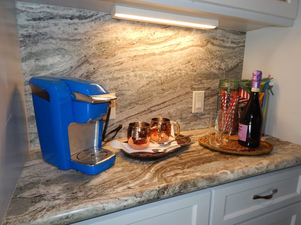 Coffee bar includes complementary basic essentials for a cup of joe. 