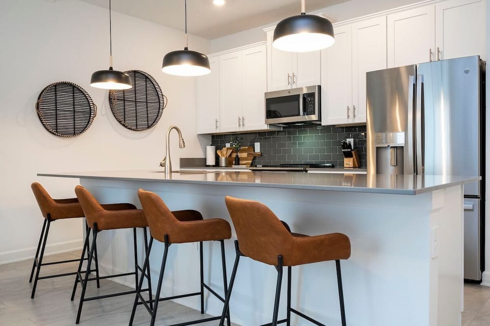Fall in love for modern luxury with our stunning open kitchen—a beautiful, vibrant space that seamlessly combines style and functionality. a family-friendly retreat where the joy of cooking meets the warmth of togetherness.