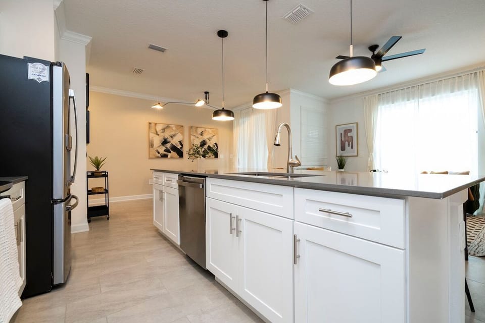 Fall in love for modern luxury with our stunning open kitchen—a beautiful, vibrant space that seamlessly combines style and functionality. a family-friendly retreat where the joy of cooking meets the warmth of togetherness.