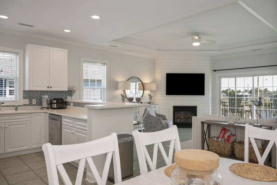 The Open Concept Living/Dining/Kitchen means everyone can participate in different activities, yet be together.