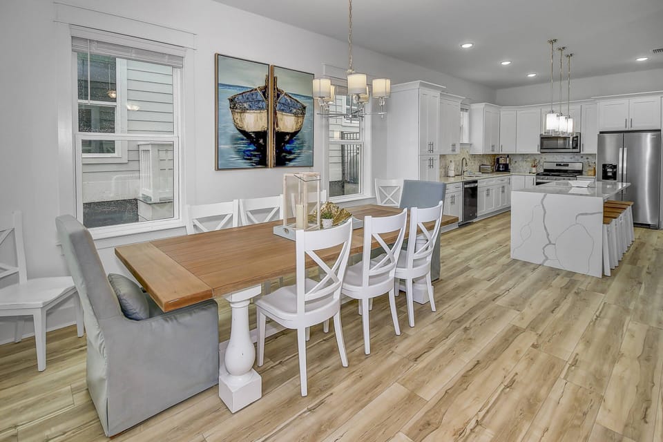 Well appointed gourmet kitchen with expansive island and large dining table!!