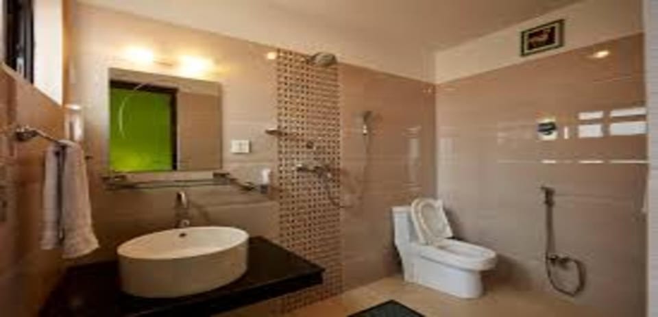 Shower, rainfall showerhead, towels, soap