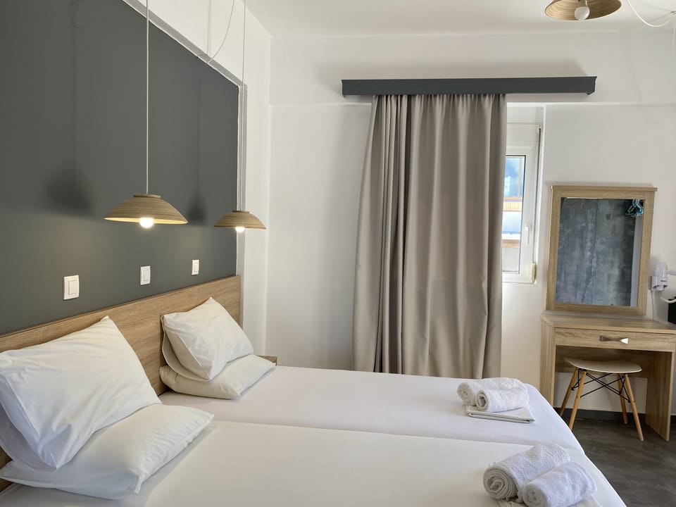 Double Twin Room | 1 bedroom, in-room safe, laptop workspace, blackout drapes