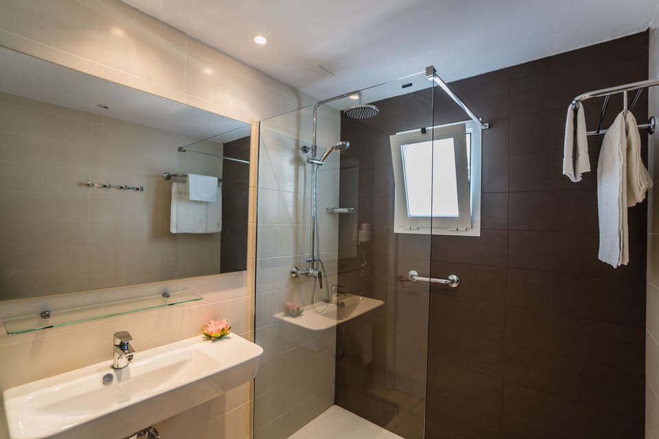 Family Apartment, 1 Bedroom, Balcony | Bathroom | Shower, hair dryer, towels, shampoo