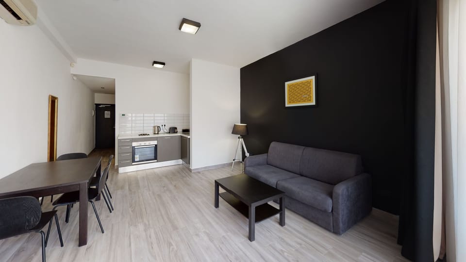 Apartment, 1 Bedroom | Living area | Flat-screen TV