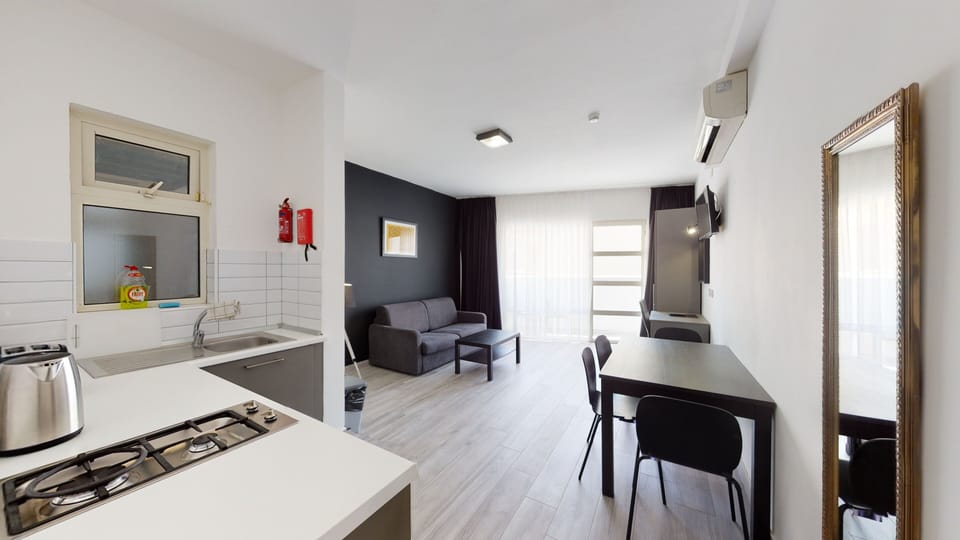 Apartment, 1 Bedroom | Living area | Flat-screen TV